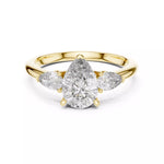 Заредете изображението в галерията: Triamara – годежен пръстен с 3 Pear диаманта, централен 1.20 ct и елегантни странични камъни в 14К жълто злато