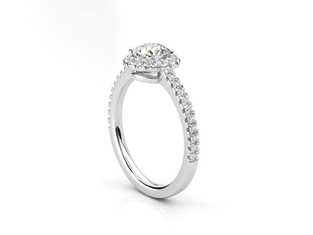 Aureline – годежен пръстен с диамант 0.65 ct и нежен ореол от диаманти в 14К бяло злато