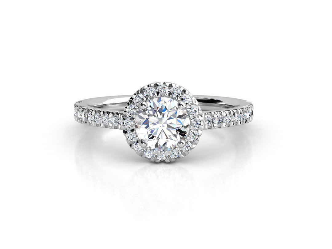 Aureline – годежен пръстен с диамант 0.65 ct и нежен ореол от диаманти в 14К бяло злато