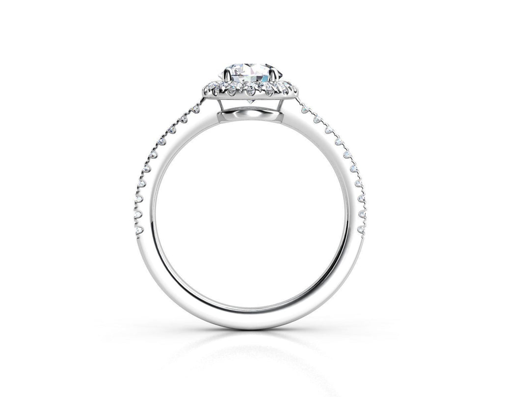 Aureline – годежен пръстен с диамант 0.65 ct и нежен ореол от диаманти в 14К бяло злато