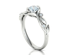 Floria – годежен пръстен с кръгъл диамант 0.80 ct и флорални детайли в 14К бяло злато