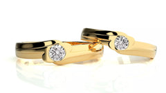 Nexus – брачни халки с инкрустиран диамант и модерен обков в 14К жълто злато