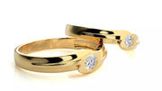 Nexus – брачни халки с инкрустиран диамант и модерен обков в 14К жълто злато