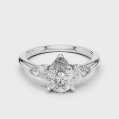 Triamara – годежен пръстен с 3 Pear диаманта, централен 1.20 ct и елегантни странични камъни в 14К бяло злато