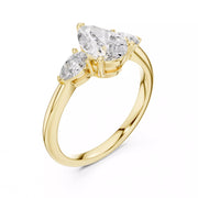 Triamara – годежен пръстен с 3 Pear диаманта, централен 1.20 ct и елегантни странични камъни в 14К жълто злато