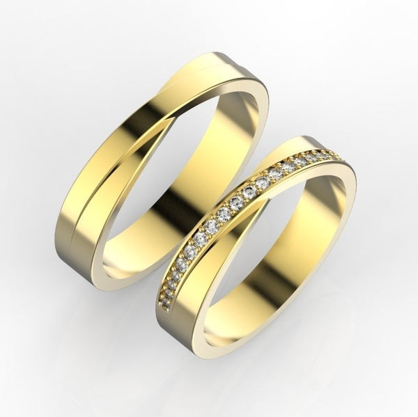 Inflexio – Брачни халки с диаманти с централен канал в жълто злато